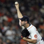 
              Houston Astros starting pitcher Justin Verlander throws against the Philadelphia Phillies during the third inning of a baseball game Tuesday, Oct. 4, 2022, in Houston. (AP Photo/David J. Phillip)
            