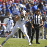 
              Kentucky quarterback Will Levis (7) looks to pass during the first half of an NCAA college football game against Mississippi in Oxford, Miss., Saturday, Oct. 1, 2022. (AP Photo/Thomas Graning)
            