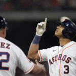 
              Houston Astros' Jeremy Pena (3) celebrates after hitting a RBI single against the Tampa Bay Rays during the third inning of a baseball game Saturday, Oct. 1, 2022, in Houston. (AP Photo/David J. Phillip)
            