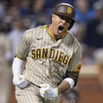 
              San Diego Padres Manny Machado reacts as he rounds the bases after hitting a solo home run against the New York Mets during the fifth inning of Game 1 of a National League wild-card baseball playoff series, Friday, Oct. 7, 2022, in New York. (AP Photo/Frank Franklin II)
            