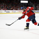 
              Washington Capitals left wing Alex Ovechkin shoots the puck during the first period of the team's NHL hockey game against the Boston Bruins, Wednesday, Oct. 12, 2022, in Washington. (AP Photo/Nick Wass)
            