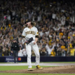 
              San Diego Padres relief pitcher Josh Hader celebrates after the Padres defeated the Los Angeles Dodgers 5-3 in Game 4 of a baseball NL Division Series, Saturday, Oct. 15, 2022, in San Diego. (AP Photo/Ashley Landis)
            