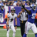 
              Baltimore Ravens place kicker Justin Tucker (9) reacts after missing a field goal during the first half of an NFL football game against the New York Giants Sunday, Oct. 16, 2022, in East Rutherford, N.J. (AP Photo/Seth Wenig)
            
