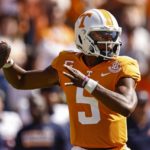 
              Tennessee quarterback Hendon Hooker (5) throws to a receiver during the first half of an NCAA college football game against the Tennessee Martin Saturday, Oct. 22, 2022, in Knoxville, Tenn. (AP Photo/Wade Payne)
            