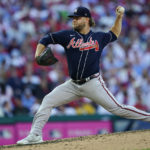 
              Atlanta Braves relief pitcher A.J. Minter (33) works during the fifth inning in Game 4 of baseball's National League Division Series between the Philadelphia Phillies and the Atlanta Braves, Saturday, Oct. 15, 2022, in Philadelphia. (AP Photo/Matt Rourke)
            