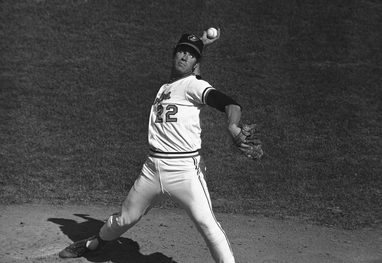 FILE - Baltimore pitcher Jim Palmer (22) delivers during a World Series game, Monday, Oct. 11, 1971...