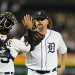 
              Detroit Tigers catcher Eric Haase greets relief pitcher Andrew Chafin after the ninth inning of a baseball game against the Minnesota Twins, Saturday, Oct. 1, 2022, in Detroit. (AP Photo/Carlos Osorio)
            