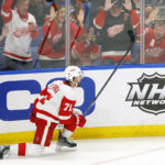 
              Detroit Red Wings center Dylan Larkin (71) celebrates after his goal during the third period of an NHL hockey game against the Buffalo Sabres, Monday, Oct. 31, 2022, in Buffalo, N.Y. (AP Photo/Jeffrey T. Barnes)
            