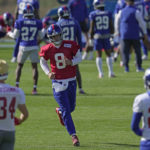 
              New York Giants quarterback Daniel Jones, number 8, attends a practice session at Hanbury Manor in Ware, England, Friday, Oct. 7, 2022 ahead the NFL game against Green Bay Packers at the Tottenham Hotspur stadium on Sunday. (AP Photo/Kin Cheung)
            