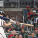 
              Atlanta Braves Matt Olson hits a home run in the sixth inning of a baseball against the New York Mets, Sunday, Oct. 2, 2022, in Atlanta. (AP Photo/Hakim Wright Sr.)
            