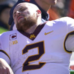 
              Minnesota quarterback Tanner Morgan is transported to the locker room after being injured in the second half of an NCAA college football game against Illinois, Saturday, Oct. 15, 2022, in Champaign, Ill. (AP Photo/Charles Rex Arbogast)
            