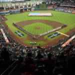 
              The Houston Astros and the Seattle Mariners line up for the national anthem before Game 1 of an American League Division Series baseball game in Houston,Tuesday, Oct. 11, 2022. (AP Photo/Eric Gay)
            