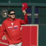 
              Philadelphia Phillies interim manager Rob Thomson removes his cap during baseball practice Thursday, Oct. 6, 2022, in St. Louis. The Phillies and St. Louis Cardinals are set to play Game 1 of a National League Wild Card baseball playoff series on Friday in St. Louis. (AP Photo/Jeff Roberson)
            