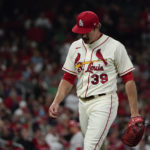 
              St. Louis Cardinals starting pitcher Miles Mikolas walks to the dugout after the second inning in Game 2 of a National League wild-card baseball playoff series against the Philadelphia Phillies, Saturday, Oct. 8, 2022, in St. Louis. (AP Photo/Jeff Roberson)
            