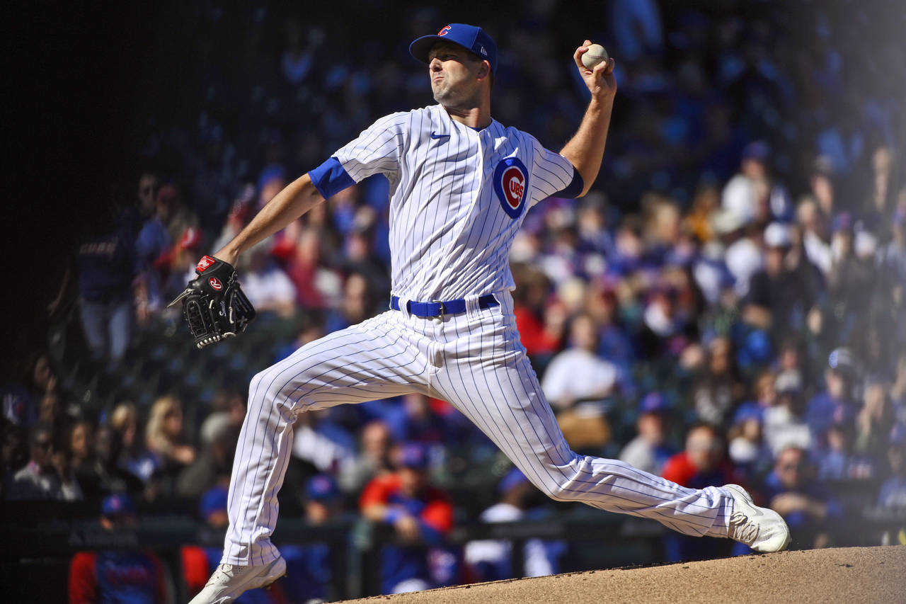 Chicago Cubs starting pitcher Drew Smyly delivers against the Cincinnati Reds during the first inni...