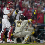
              San Diego Padres' Jurickson Profar reacts after striking out during the ninth inning in Game 3 of the baseball NL Championship Series between the San Diego Padres and the Philadelphia Phillies on Friday, Oct. 21, 2022, in Philadelphia. (AP Photo/Matt Slocum)
            