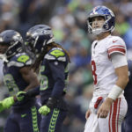 
              New York Giants quarterback Daniel Jones (8) reacts after a play during the second half of an NFL football game against the Seattle Seahawks in Seattle, Sunday, Oct. 30, 2022. (AP Photo/John Froschauer)
            