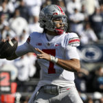 
              Ohio State quarterback C.J. Stroud (7) throws a pass against Penn State during the first half of an NCAA college football game, Saturday, Oct. 29, 2022, in State College, Pa. (AP Photo/Barry Reeger)
            