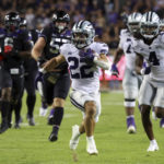 
              Kansas State running back Deuce Vaughn (22) carries the ball on a touchdown run during the first half of the team's NCAA college football game against TCU Saturday, Oct. 22, 2022, in Fort Worth, Texas. (AP Photo/Richard W. Rodriguez)
            