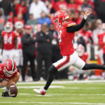 
              Maryland place kicker Chad Ryland, right, with Colton Spangler holding, kicks a field goal against Michigan State during the second half of an NCAA college football game, Saturday, Oct. 1, 2022, in College Park, Md. (AP Photo/Julio Cortez)
            