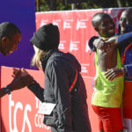 
              Benson Kipruto, left, and John Korir, second from right, both of Kenya, celebrate after they ran the Chicago Marathon, Sunday, Oct. 9, 2022, in Chicago. Kipruto took first place and Korir took third. (AP Photo/Matt Marton)
            