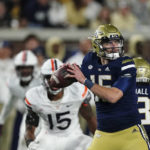 
              Georgia Tech quarterback Zach Gibson (15) looks for a receiver during the first half of the team's NCAA college football game against Virginia on Thursday, Oct. 20, 2022, in Atlanta. (AP Photo/John Bazemore)
            