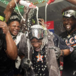
              Houston Astros manager Dusty Baker Jr., center, celebrates with pitcher Hector Neris, left, and pitcher Cristian Javier, right, after defeating the Seattle Mariners in Game 3 of an American League Division Series baseball game Saturday, Oct. 15, 2022, in Seattle. (AP Photo/Abbie Parr)
            