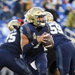 
              Navy quarterback Xavier Arline looks to pass the ball during the second half of an NCAA college football game against Temple, Saturday, Oct. 29, 2022, in Annapolis, Md. (AP Photo/Terrance Williams)
            