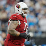 
              Arizona Cardinals guard Will Hernandez leaves the field after getting disqualify during the second half of an NFL football game against the Carolina Panthers on Sunday, Oct. 2, 2022, in Charlotte, N.C. (AP Photo/Rusty Jones)
            