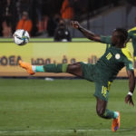 
              FILE - Senegal's Sadio Mane tries to shoot during a qualifying soccer match against Egypt, for the FIFA World Cup Qatar 2022 at Cairo International stadium in Cairo, Egypt, Friday, March 25, 2022. (AP Photo/Amr Nabil, File)
            