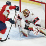 
              Florida Panthers left wing Rudolfs Balcers (38) attempts a shot at Ottawa Senators goaltender Anton Forsberg (31) during the second period of an NHL hockey game, Saturday, Oct. 29, 2022, in Sunrise, Fla. (AP Photo/Wilfredo Lee)
            