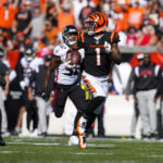
              Cincinnati Bengals wide receiver Ja'Marr Chase (1) runs for a touchdown after a catch against the Atlanta Falcons in the first half of an NFL football game in Cincinnati, Sunday, Oct. 23, 2022. (AP Photo/Jeff Dean)
            