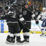 
              The Los Angeles Kings celebrate after center Gabriel Vilardi (13) scored during the second period of an NHL hockey game against the Tampa Bay Lightning Tuesday, Oct. 25, 2022, in Los Angeles. (AP Photo/Ashley Landis)
            