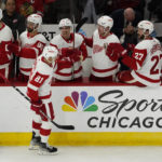
              Detroit Red Wings left wing Dominik Kubalik (81) celebrates after a goal against the Chicago Blackhawks during the second period of an NHL hockey game Friday, Oct. 21, 2022, in Chicago. (AP Photo/David Banks)
            