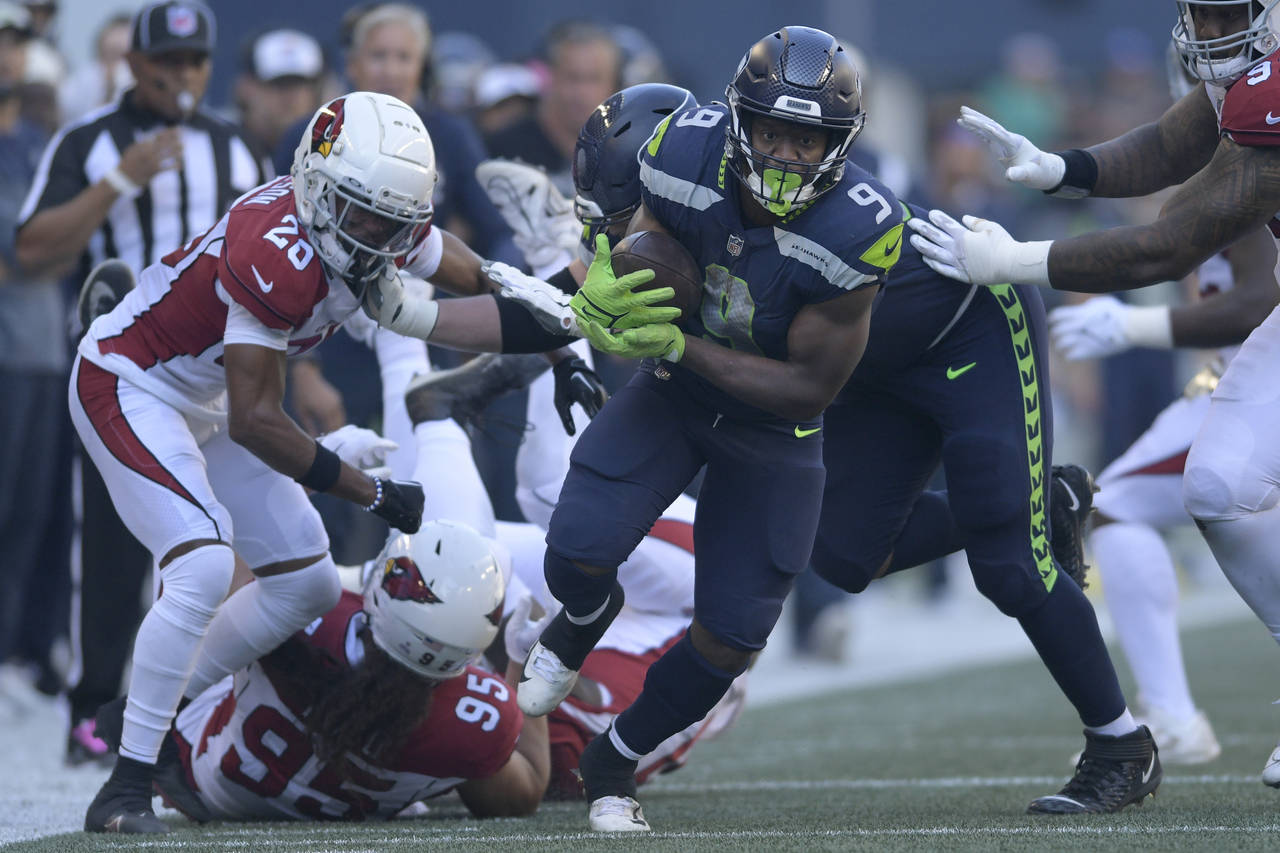 Seattle Seahawks running back Kenneth Walker III (9) runs against the Arizona Cardinals during the ...
