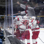 
              Carolina Hurricanes celebrate after Martin Necas scored against the San Jose Sharks during the second period of an NHL hockey game in San Jose, Calif., Friday, Oct. 14, 2022. (AP Photo/Godofredo A. Vásquez)
            