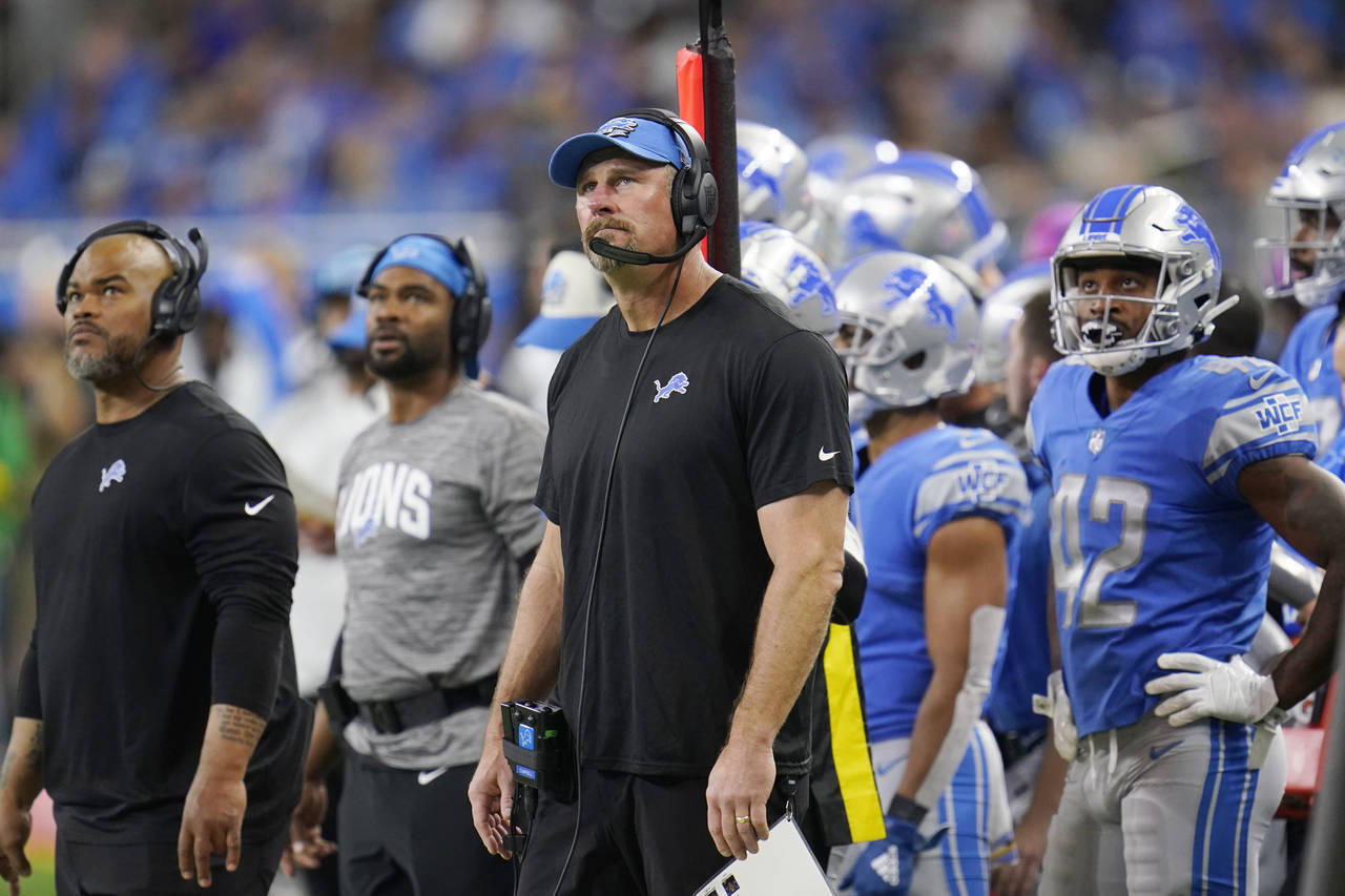 Detroit Lions head coach Dan Campbell watches from the sideline during the first half of an NFL foo...