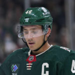 
              Minnesota Wild defenseman Jared Spurgeon pauses during the second period of the team's NHL hockey game against the New York Rangers, Thursday, Oct. 13, 2022, in St. Paul, Minn. (AP Photo/Abbie Parr)
            