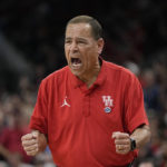 
              FILE - Houston head coach Kelvin Sampson yells during the first half of a college basketball game against Arizona in the Sweet 16 round of the NCAA tournament on Thursday, March 24, 2022, in San Antonio. Houston is No. 3 in the preseason AP Top 25 men's basketball poll released Monday, Oct. 17, 2022. (AP Photo/David J. Phillip, File)
            