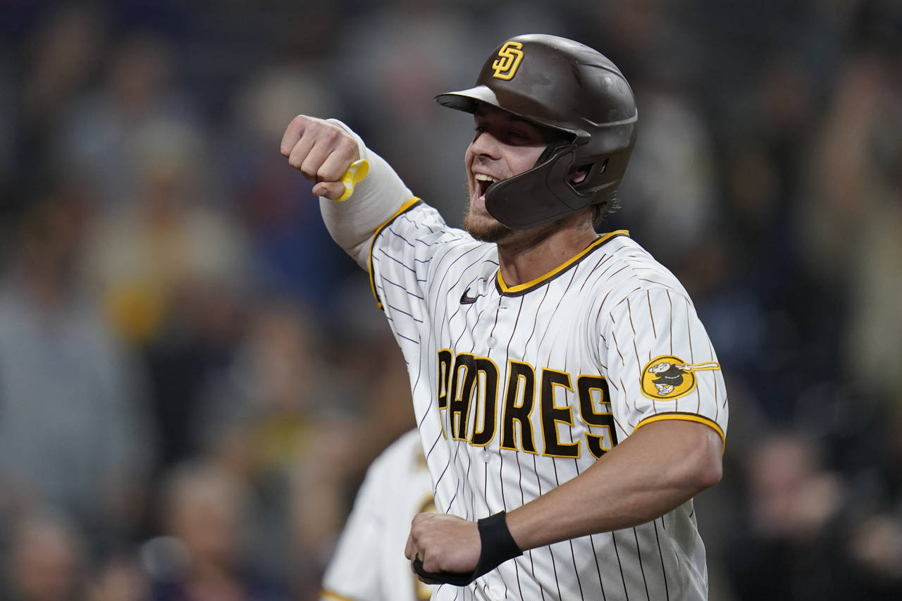 San Diego Padres' Wil Myers celebrates after hitting a home run during the eighth inning of a baseb...