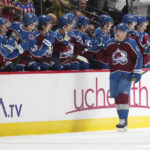 
              Colorado Avalanche left wing Artturi Lehkonen (62) is congratulated for his goal against the Chicago Blackhawks during the second period of an NHL hockey game Wednesday, Oct. 12, 2022, in Denver. (AP Photo/Jack Dempsey)
            