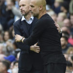 
              Manchester City's head coach Pep Guardiola, right, cheers with Manchester United's head coach Erik ten Hag at the end of the English Premier League soccer match between Manchester City and Manchester United at Etihad stadium in Manchester, England, Sunday, Oct. 2, 2022. (AP Photo/Rui Vieira)
            
