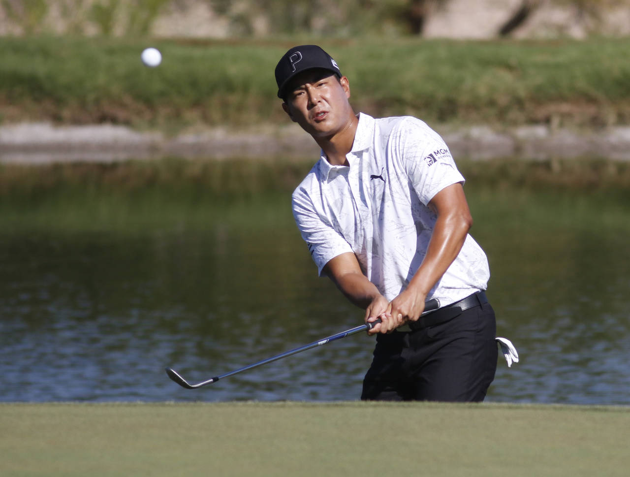 Justin Suh hits to the 17th green during the second round of the Shriners Children's Open golf tour...