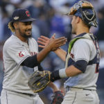
              Cleveland Guardians relief pitcher Emmanuel Clase celebrates with catcher Austin Hedges (17) after defeating the New York Yankees in Game 2 of an American League Division baseball series, Friday, Oct. 14, 2022, in New York. (AP Photo/John Minchillo)
            
