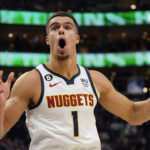 
              Denver Nuggets forward Michael Porter Jr. reacts after being called for a foul during the second half of the team's NBA basketball game against the Utah Jazz on Wednesday, Oct. 19, 2022, in Salt Lake City. (AP Photo/Rick Bowmer)
            