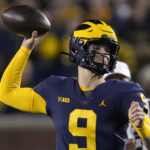 
              Michigan quarterback J.J. McCarthy (9) throws against the Michigan State in the second half of an NCAA college football game in Ann Arbor, Mich., Saturday, Oct. 29, 2022. (AP Photo/Paul Sancya)
            