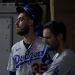
              Los Angeles Dodgers center fielder Cody Bellinger looks on from the dugout during the ninth inning in Game 3 of a baseball NL Division Series against the San Diego Padres, Friday, Oct. 14, 2022, in San Diego. (AP Photo/Jae C. Hong)
            