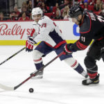 
              Carolina Hurricanes center Jordan Staal (11) and Washington Capitals left wing Conor Sheary (73) vie for the puck during the second period of an NHL hockey game Monday, Oct. 31, 2022, in Raleigh, N.C. (AP Photo/Chris Seward)
            