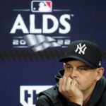 
              New York Yankees manager Aaron Boone attends a news conference before a workout ahead of Game 1 of baseball's American League Division Series against the Cleveland Guardians, Monday, Oct. 10, 2022, in New York. (AP Photo/John Minchillo)
            