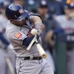 
              Houston Astros second baseman Jose Altuve (27) breaks his bat during an out against the Seattle Mariners during the fifth inning in Game 3 of an American League Division Series baseball game Saturday, Oct. 15, 2022, in Seattle. (AP Photo/Abbie Parr)
            